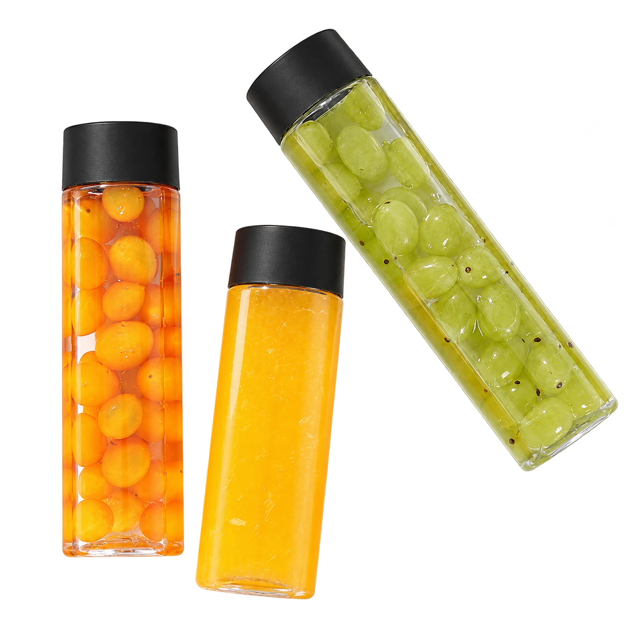 Clear bottles with fresh fruit drinks